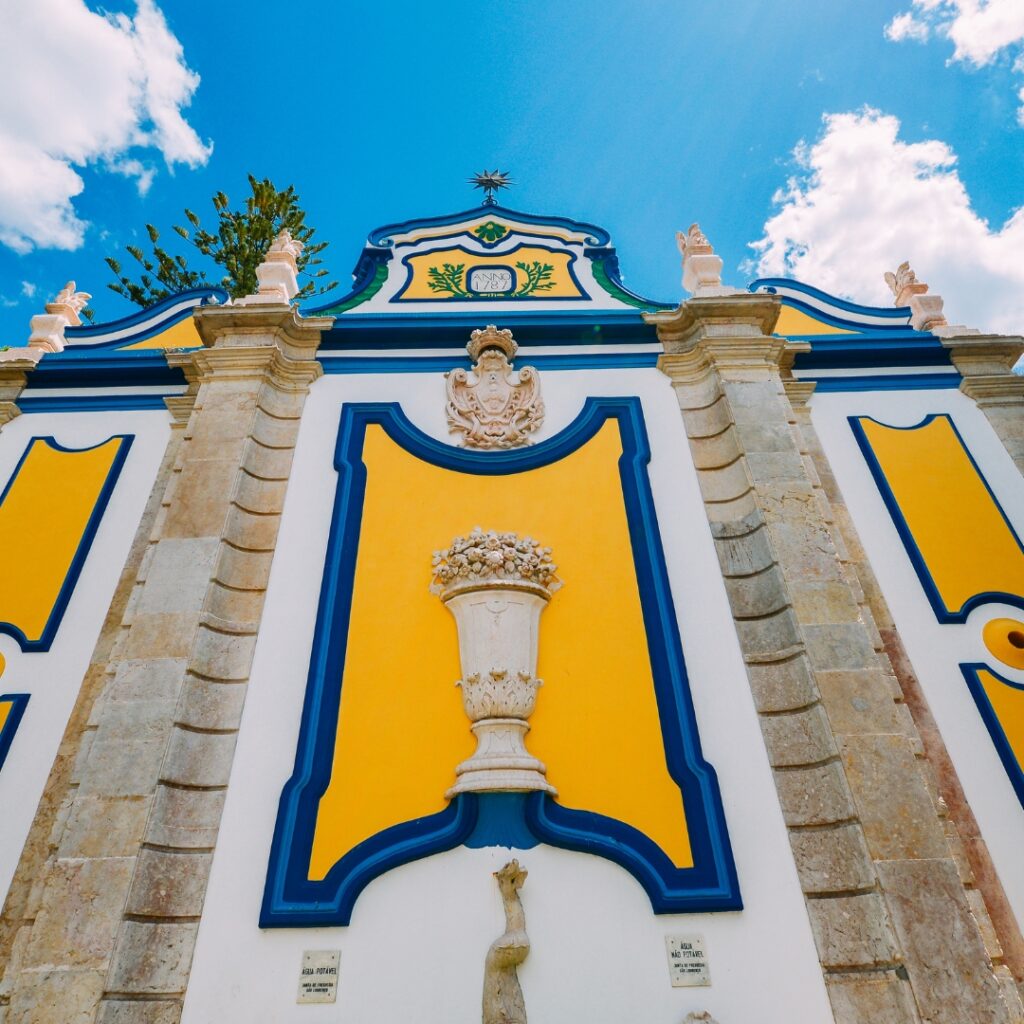 Vintage and colorful stone fountain in Azeitao village, Setubal, Portugal